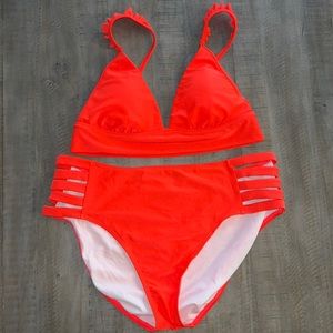 Red two piece bikini, with side cut outs
